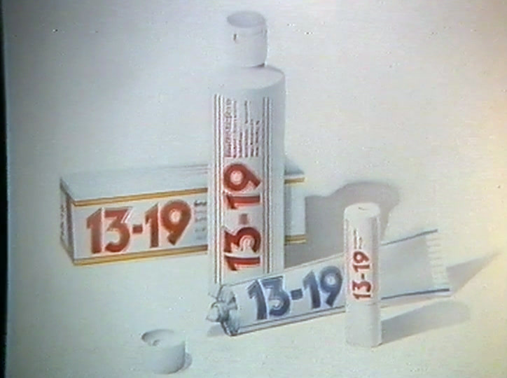 Carton, bottle, tube, stick and sachet, all marked 13-19, lit on a pale ground.