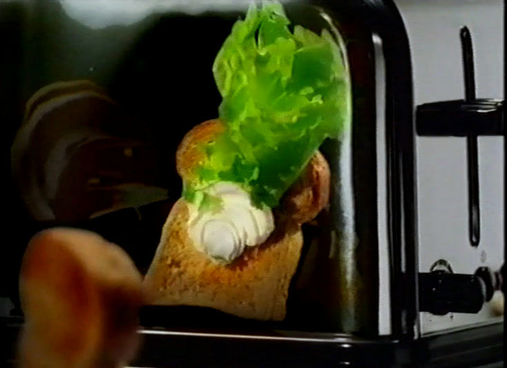 A tub of Hovi fresh cheese, drawn artichoke and basil framing the name