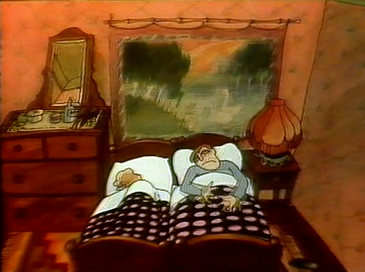 A man lies awake in bed under a spotted quilt, dresser and mirror behind him.