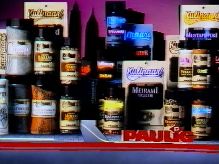 Shelf of Kulinaari jars and sachets on magenta, the red Paulig name at the corner.