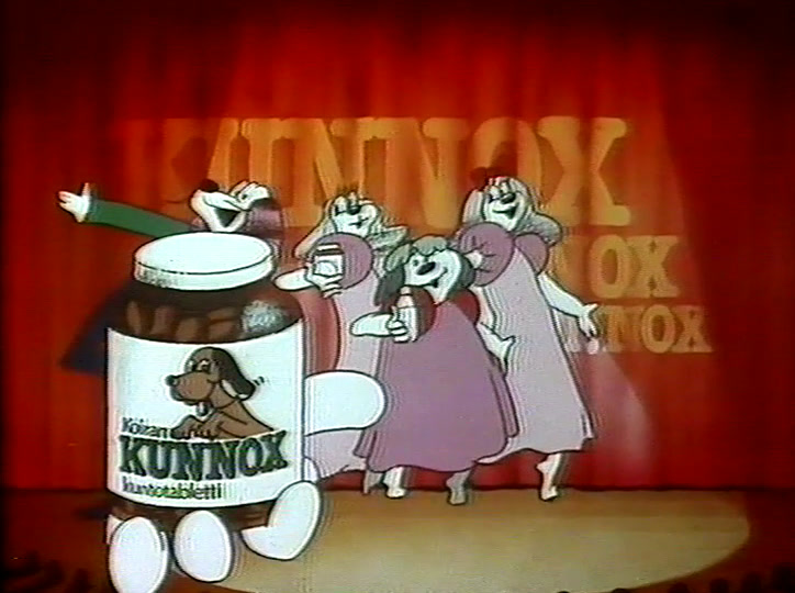 Three product tubs roll on in front of the chorus line, the Kunnox jar largest.
