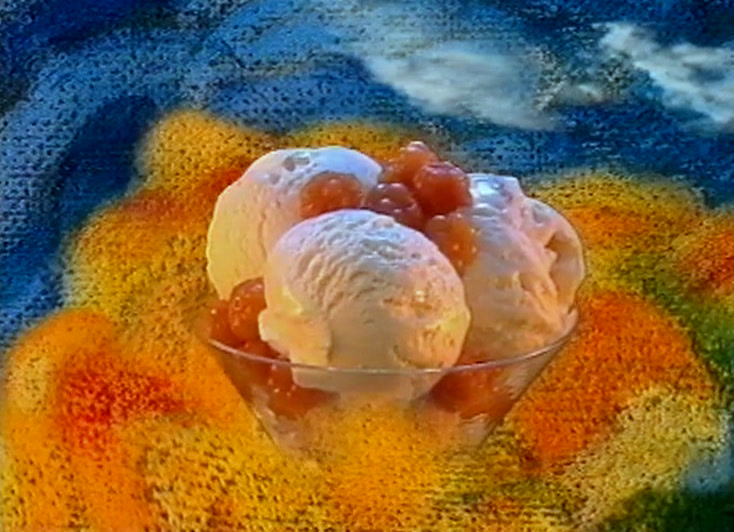 Ice cream in a footed glass with orange berries on top, painted landscape behind