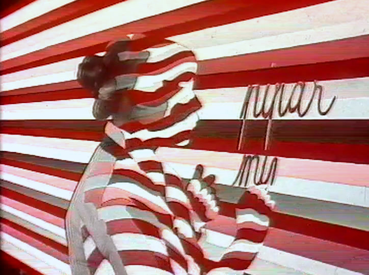 A figure made out of red and white stripes, with handwritten script beside it.