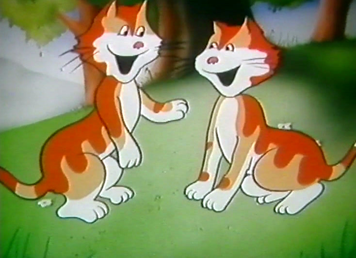 A standing cat holds out a jug of orange juice and raises one paw.