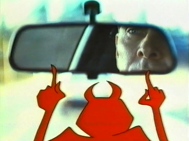 White card: a red heart inside a steering wheel above NESTE POLIISI LIIKENNETURVA AUTOLIITTO.