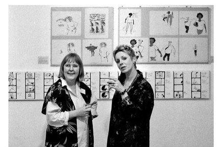 Marjut Rimminen and Christine Roche at the opening of Film & Strip, Kettle's Yard, with drawings hung in a long horizontal grid behind them
