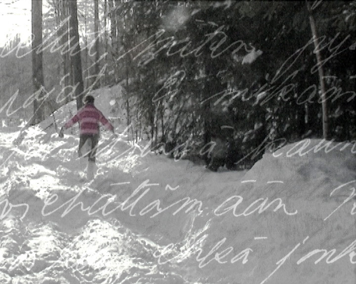 Still from Learned by Heart, a figure in a red striped jumper walking away into a snowy wood, handwritten Finnish text laid across the image